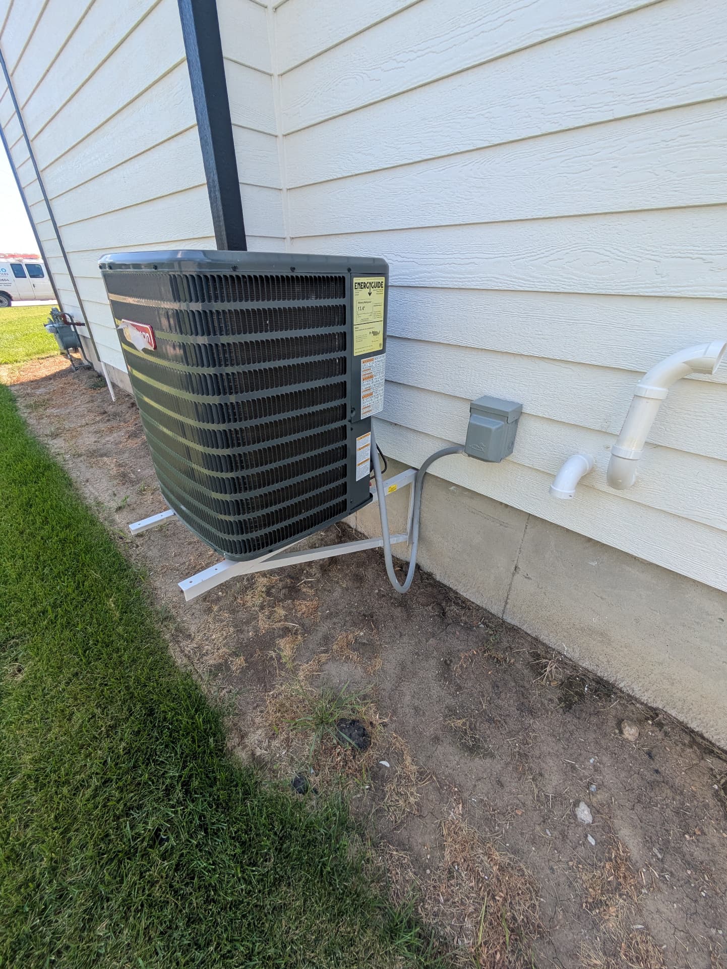 New outdoor residential condenser installed by Bruno HVAC